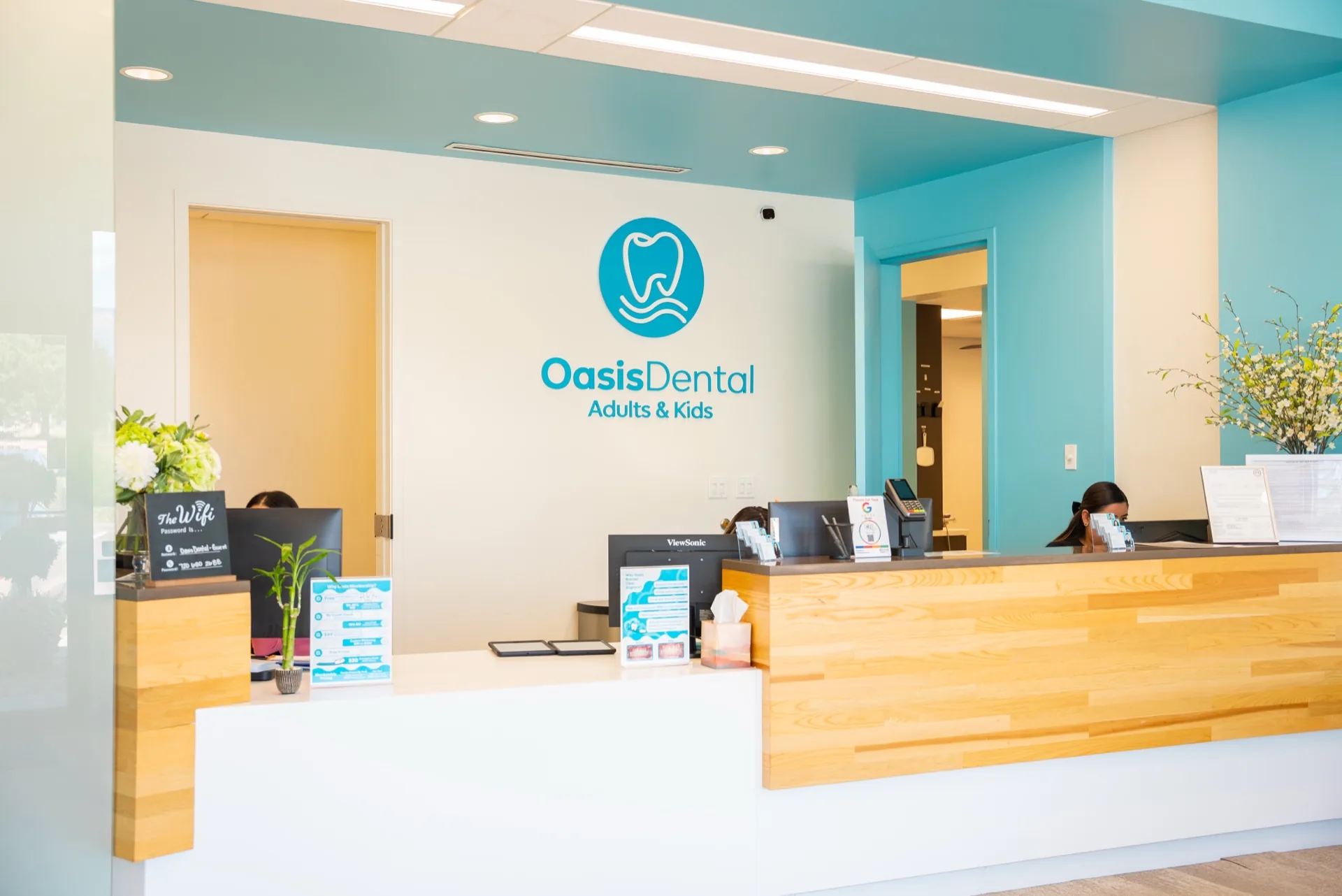 Oasis Dental reception desk with staff ready to welcome patients