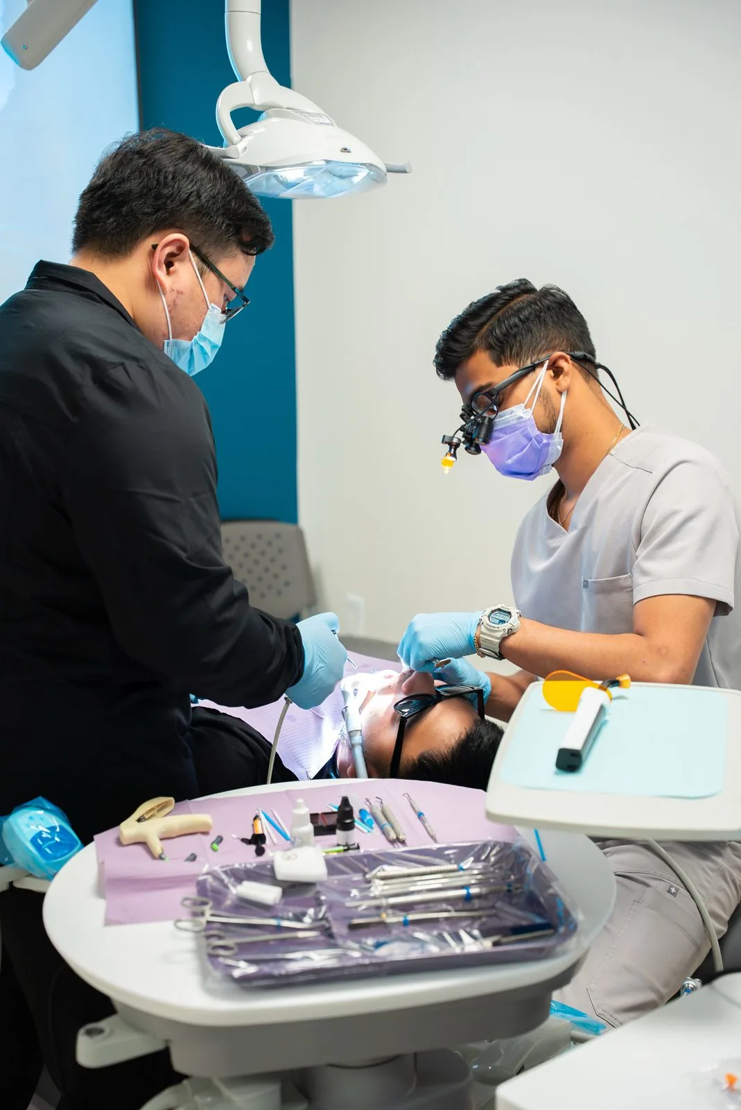 Oasis Dental doctor treating an adult patient in Aurora, CO